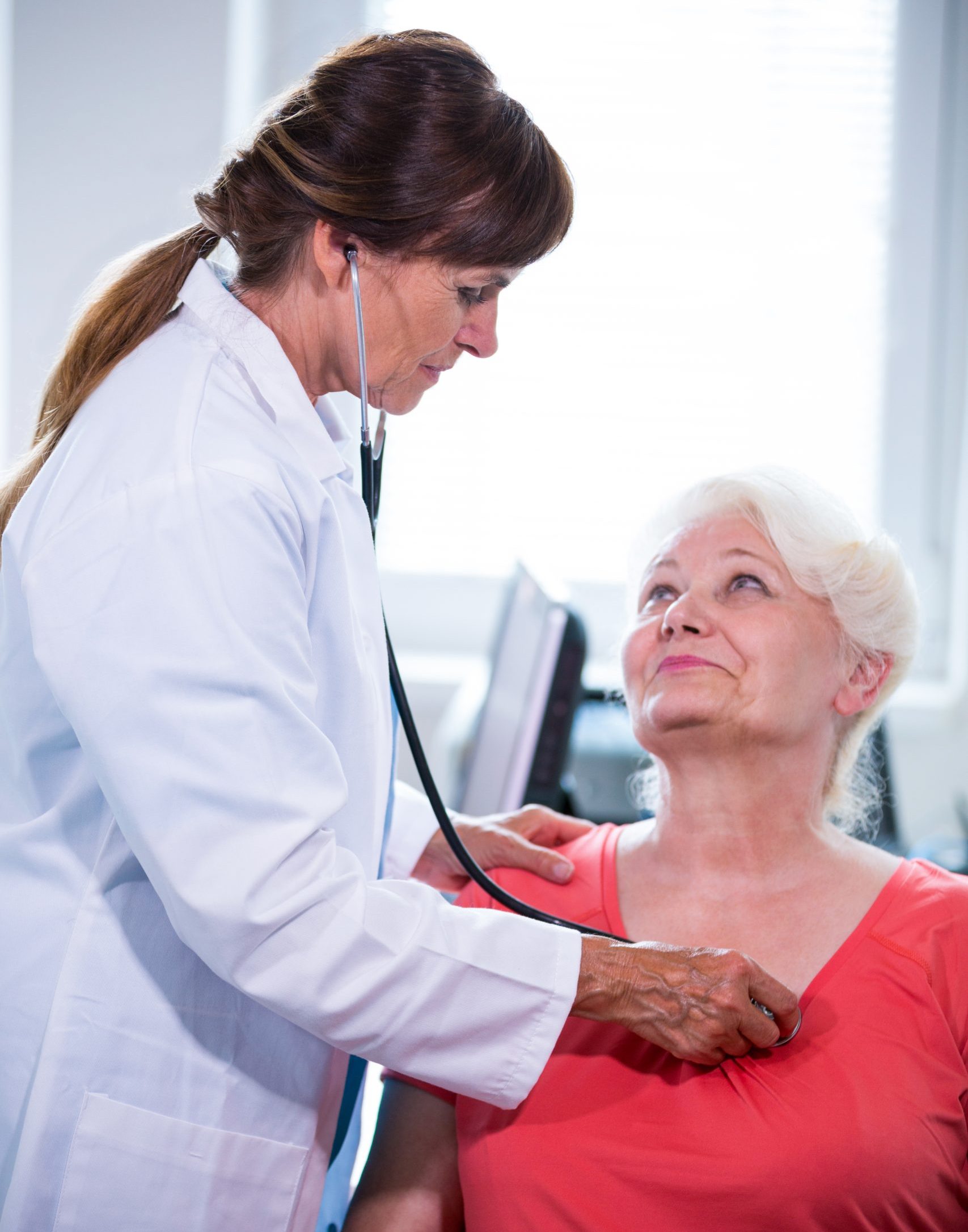 Female doctor examining a patient